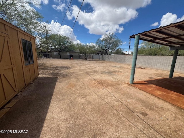 516 E Linden St, Tucson, AZ 85705 - fenced backyard with a patio area