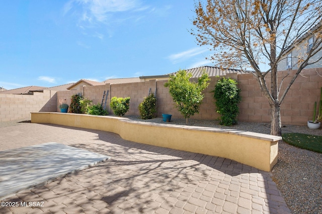 329 W Vuelta Friso, Sahuarita, AZ 85629 - fenced backyard with a patio