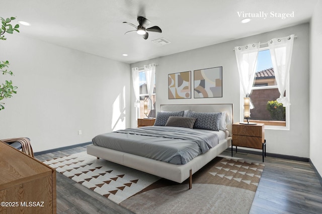 329 W Vuelta Friso, Sahuarita, AZ 85629 - bedroom with multiple windows, wood finished floors, baseboards, and recessed lighting