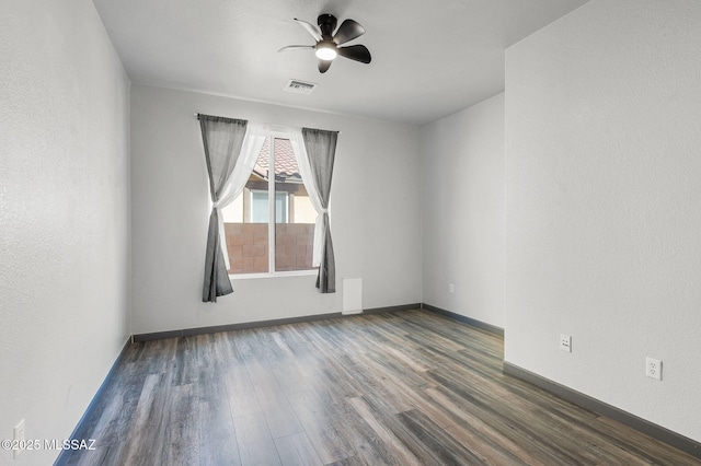 329 W Vuelta Friso, Sahuarita, AZ 85629 - empty room with wood finished floors, ceiling fan, and baseboards