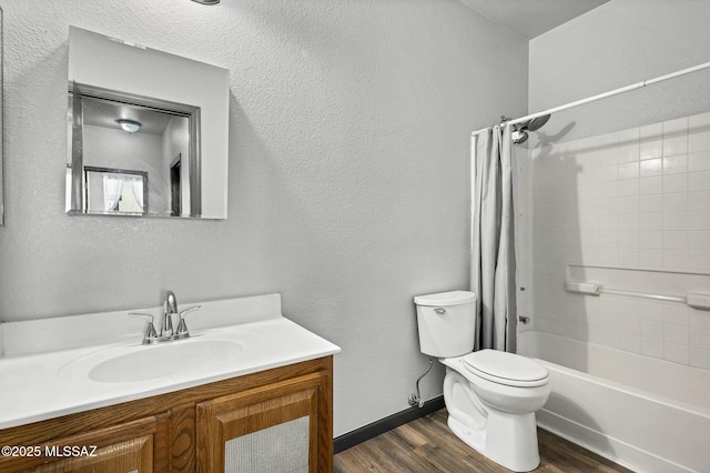 329 W Vuelta Friso, Sahuarita, AZ 85629 - bathroom with toilet, wood finished floors, vanity, and shower / bath combo with shower curtain
