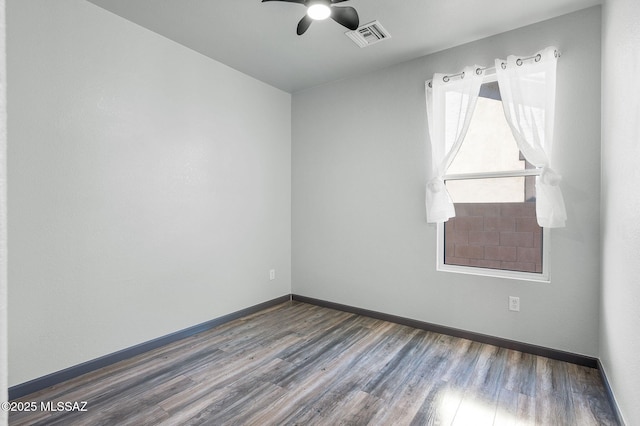329 W Vuelta Friso, Sahuarita, AZ 85629 - unfurnished room with ceiling fan, wood finished floors, and baseboards