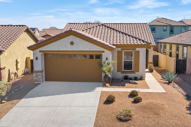 329 W Vuelta Friso, Sahuarita, AZ 85629 - mediterranean / spanish home featuring concrete driveway, an attached garage, stucco siding, and a tile roof