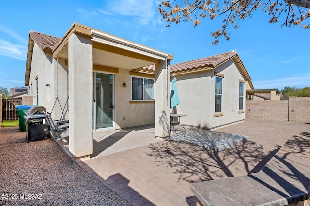 329 W Vuelta Friso, Sahuarita, AZ 85629 - rear view of property with a tile roof, stucco siding, and a patio