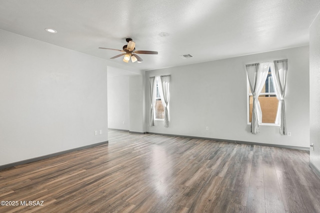 329 W Vuelta Friso, Sahuarita, AZ 85629 - spare room with a ceiling fan, wood finished floors, baseboards, and recessed lighting
