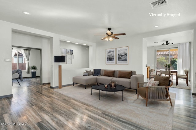 329 W Vuelta Friso, Sahuarita, AZ 85629 - living room with ceiling fan, wood finished floors, recessed lighting, and baseboards