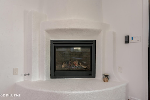 6061 N Tocito Pl, Tucson, AZ 85718 - detailed view of a glass covered fireplace