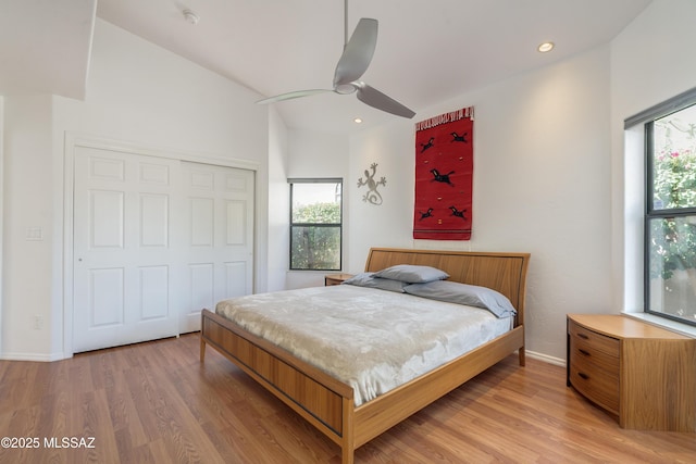 6061 N Tocito Pl, Tucson, AZ 85718 - bedroom featuring light wood-type flooring, a closet, baseboards, a ceiling fan, and recessed lighting