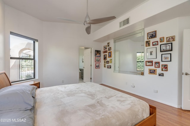 6061 N Tocito Pl, Tucson, AZ 85718 - bedroom with wood finished floors, baseboards, and a ceiling fan