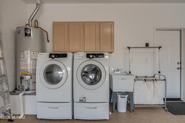 6061 N Tocito Pl, Tucson, AZ 85718 - laundry area featuring cabinet space, washer and clothes dryer, and water heater