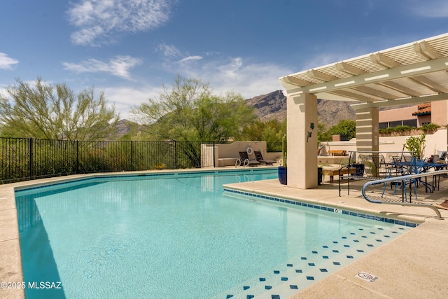 6061 N Tocito Pl, Tucson, AZ 85718 - community pool featuring a pergola, a mountain view, and a patio