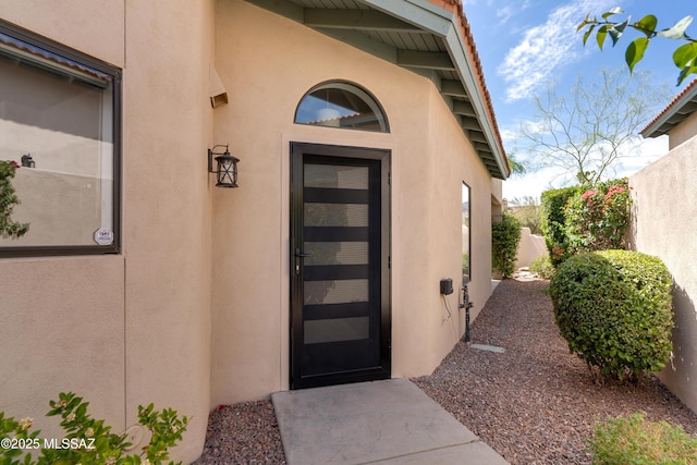 6061 N Tocito Pl, Tucson, AZ 85718 - view of exterior entry with stucco siding
