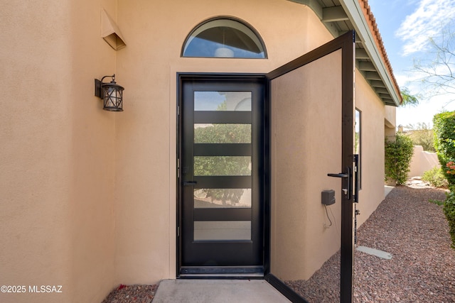 6061 N Tocito Pl, Tucson, AZ 85718 - entrance to property with stucco siding
