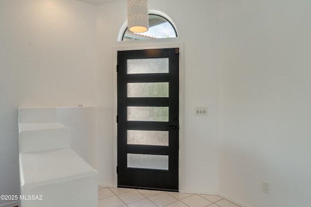 6061 N Tocito Pl, Tucson, AZ 85718 - entryway featuring light tile patterned floors