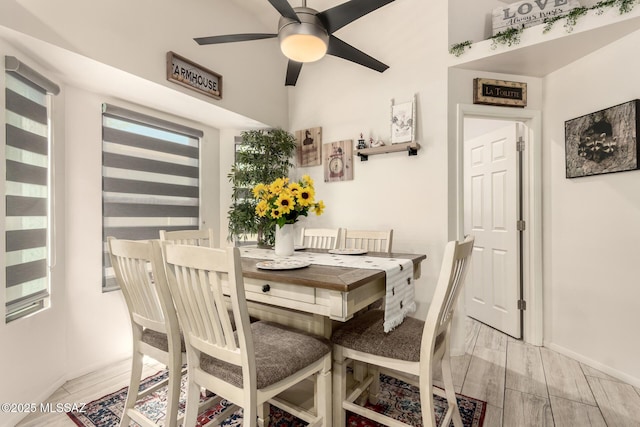 5831 N Moonbrook Rd, Tucson, AZ 85741 - dining room with a ceiling fan, baseboards, and light wood-style floors