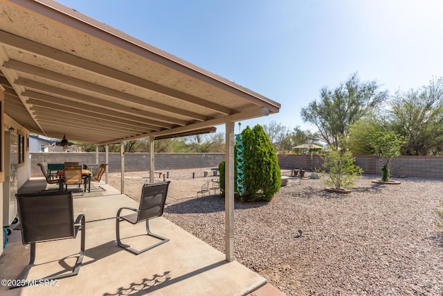5831 N Moonbrook Rd, Tucson, AZ 85741 - fenced backyard featuring outdoor dining area and a patio area