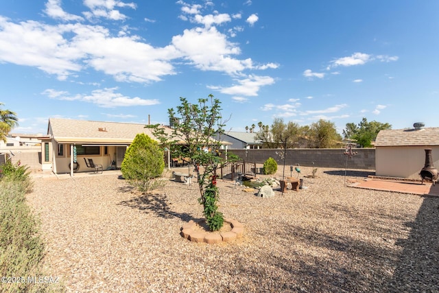 5831 N Moonbrook Rd, Tucson, AZ 85741 - fenced backyard with a patio area