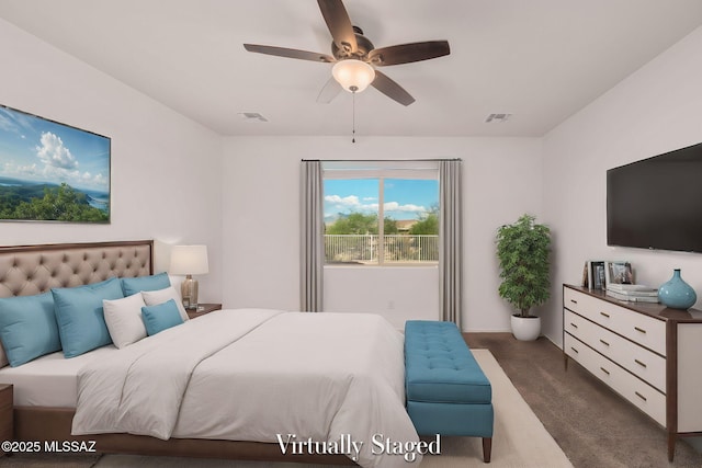 11324 Granite Gulch Way, Tucson, AZ 85747 - bedroom with dark carpet and ceiling fan