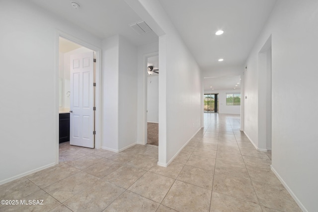 11324 Granite Gulch Way, Tucson, AZ 85747 - hall featuring recessed lighting, light tile patterned floors, and baseboards