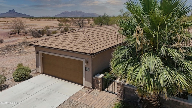 22100 E Statehood Ln, Red Rock, AZ 85145 - garage with a mountain view, driveway, a gate, a desert view, and a rural view