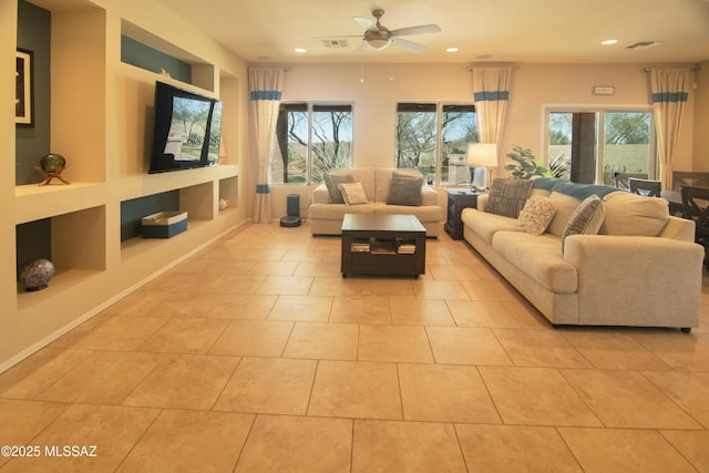 22100 E Statehood Ln, Red Rock, AZ 85145 - living room with built in features, recessed lighting, ceiling fan, and light tile patterned floors