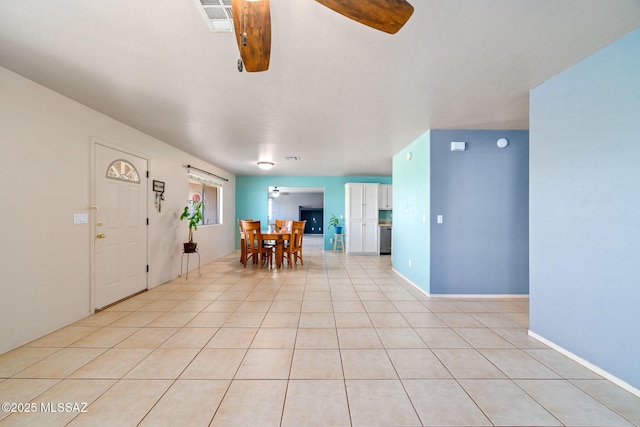 1448 N Calle Futura, Oracle, AZ 85623 - dining room with ceiling fan and light tile patterned floors