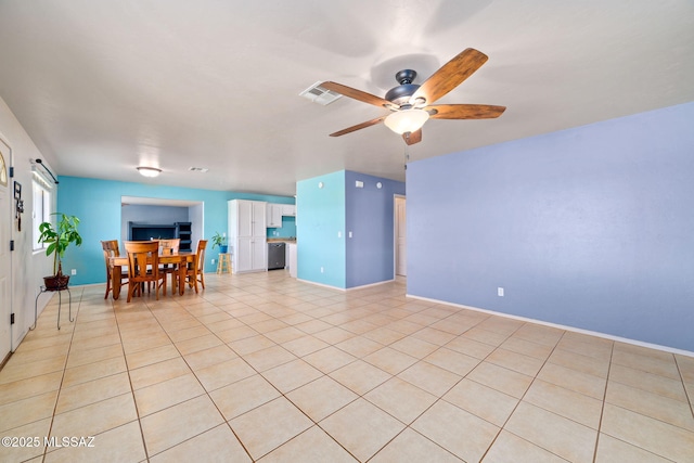 1448 N Calle Futura, Oracle, AZ 85623 - living room with ceiling fan, light tile patterned floors, and baseboards
