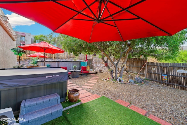 1448 N Calle Futura, Oracle, AZ 85623 - fenced backyard with a hot tub and a patio area