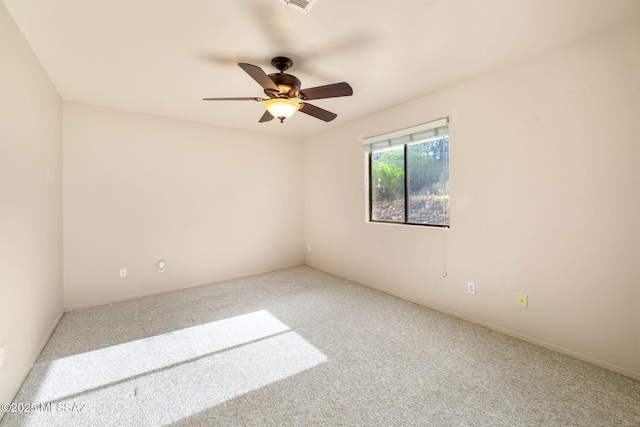 1448 N Calle Futura, Oracle, AZ 85623 - unfurnished room featuring carpet flooring, ceiling fan, and baseboards