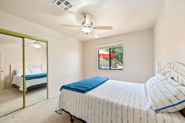 1448 N Calle Futura, Oracle, AZ 85623 - carpeted bedroom with a closet and a ceiling fan