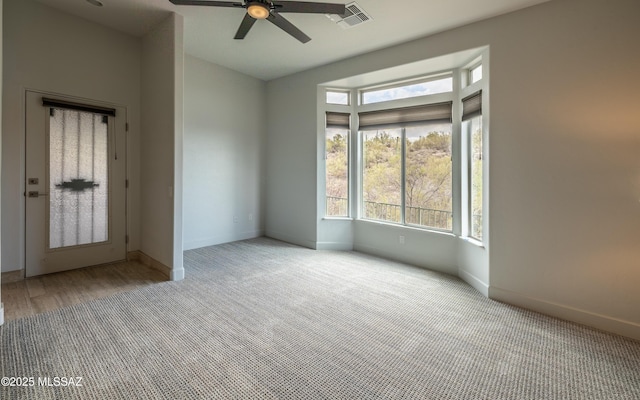 13570 N Nightstar Ct, Marana, AZ 85658 - carpeted empty room featuring ceiling fan and baseboards