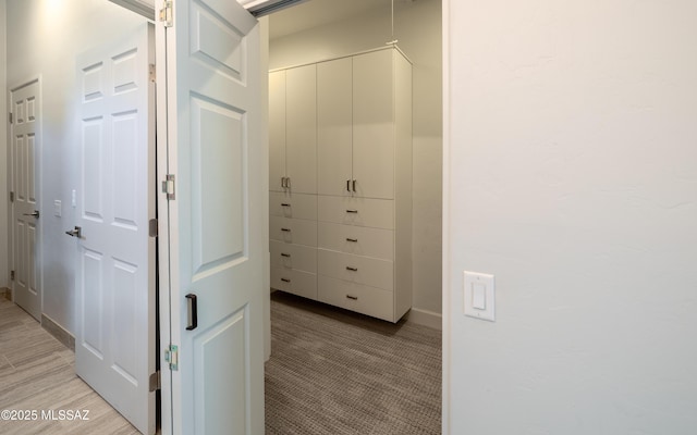 13570 N Nightstar Ct, Marana, AZ 85658 - corridor with baseboards and light carpet