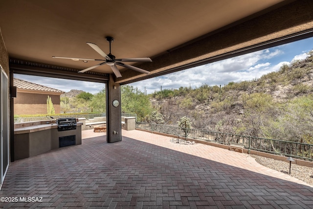 13570 N Nightstar Ct, Marana, AZ 85658 - view of patio / terrace with a ceiling fan