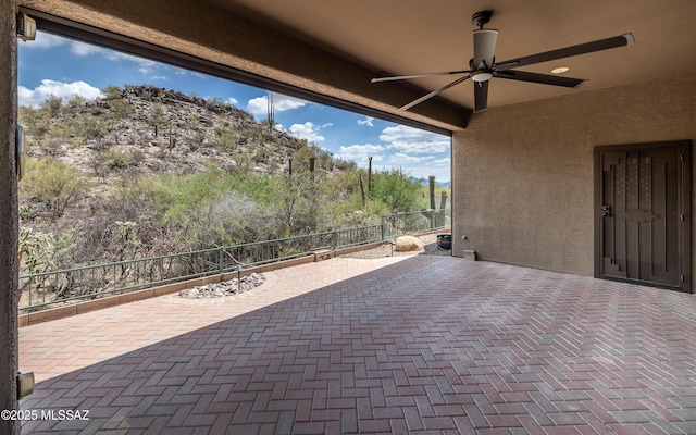 13570 N Nightstar Ct, Marana, AZ 85658 - view of patio / terrace featuring a ceiling fan