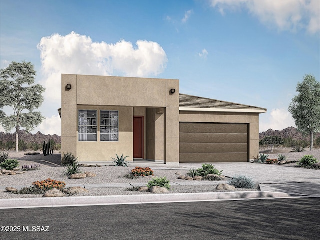 10088 S Arnold Ranch Ct, Vail, AZ 85641 - view of front of home featuring driveway, a garage, and stucco siding