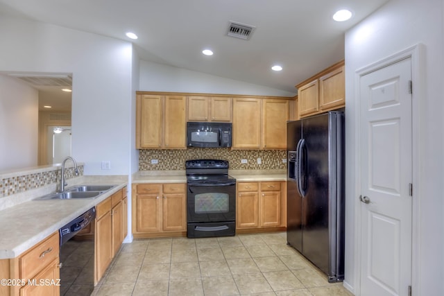 7077 S Cottontail Run Ave, Tucson, AZ 85756 - kitchen featuring black appliances, a sink, tasteful backsplash, light countertops, and vaulted ceiling