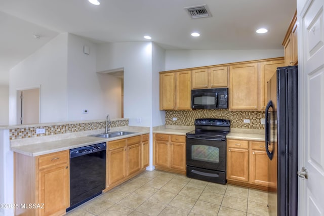 7077 S Cottontail Run Ave, Tucson, AZ 85756 - kitchen featuring black appliances, lofted ceiling, a sink, a peninsula, and tasteful backsplash