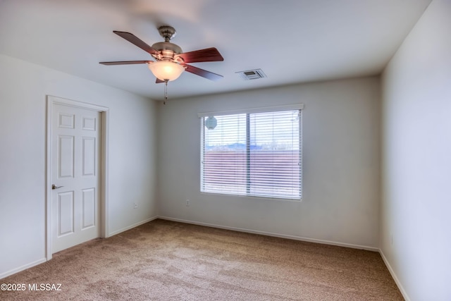 7077 S Cottontail Run Ave, Tucson, AZ 85756 - unfurnished room featuring carpet floors, ceiling fan, and baseboards