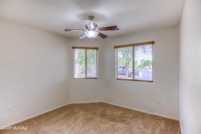 7077 S Cottontail Run Ave, Tucson, AZ 85756 - carpeted spare room with plenty of natural light, ceiling fan, and baseboards