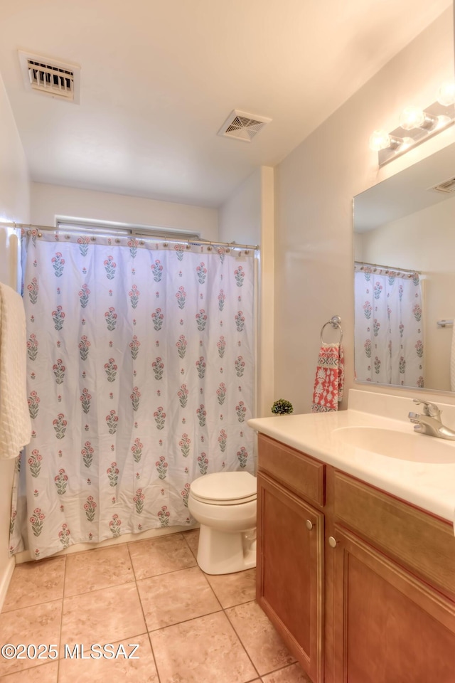 7077 S Cottontail Run Ave, Tucson, AZ 85756 - full bath with vanity, toilet, tile patterned floors, and curtained shower