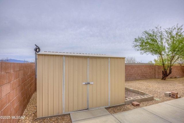 7077 S Cottontail Run Ave, Tucson, AZ 85756 - view of shed with a fenced backyard