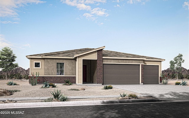 12775 E Tortoise Pointe Dr, Vail, AZ 85641 - view of front of property featuring an attached garage, decorative driveway, and brick siding