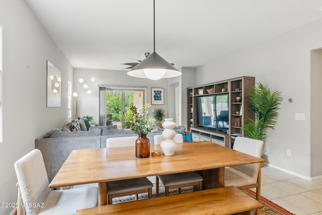 208 E Calle Trona, Green Valley, AZ 85614 - dining area featuring light tile patterned floors and baseboards