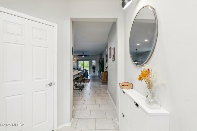 208 E Calle Trona, Green Valley, AZ 85614 - hall featuring baseboards and light tile patterned flooring