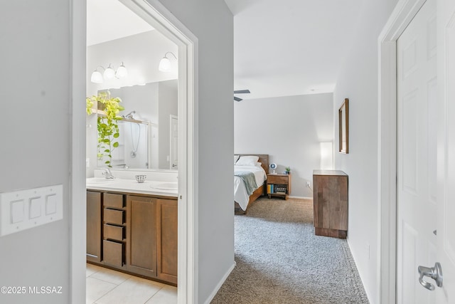208 E Calle Trona, Green Valley, AZ 85614 - hallway with light colored carpet and a sink