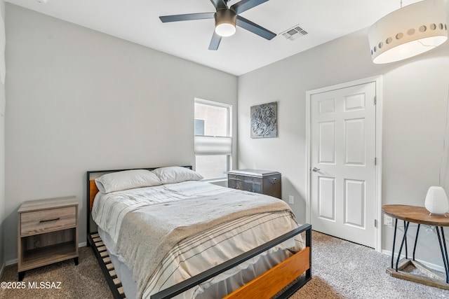 208 E Calle Trona, Green Valley, AZ 85614 - carpeted bedroom with a ceiling fan and baseboards