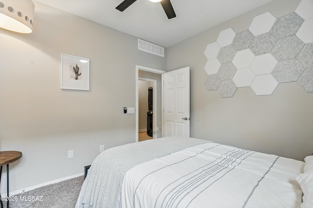 208 E Calle Trona, Green Valley, AZ 85614 - bedroom featuring carpet flooring, baseboards, and a ceiling fan