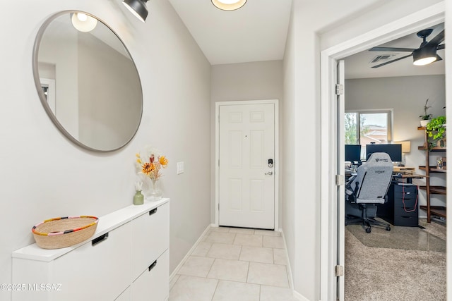 208 E Calle Trona, Green Valley, AZ 85614 - entryway with ceiling fan, baseboards, and light tile patterned floors