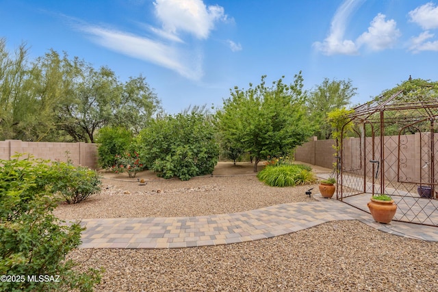 208 E Calle Trona, Green Valley, AZ 85614 - fenced backyard with a patio area and a gazebo