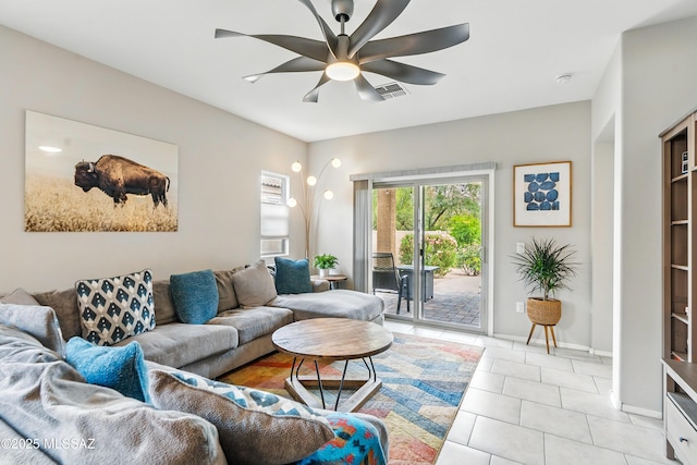 208 E Calle Trona, Green Valley, AZ 85614 - living area with ceiling fan, light tile patterned flooring, and baseboards